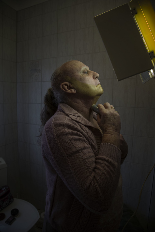 &copy; Molly Harris. Being Sandra.
&ldquo;Sandra was born as John but started living as Sandra six years ago. When she became Sandra, she left behind a career that spanned 37 years in the Air Force. In this photo, Sandra is getting ready for Anzac Day.&rdquo;